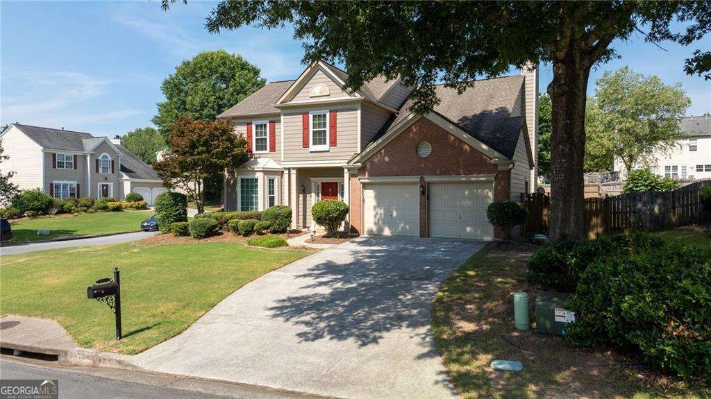 This beautiful EAST FACING home offers plenty of space, with 4 bedrooms and 2.5 bathrooms. Preparing meals will be a joy with plenty of granite countertop, kitchen island, and hood over the stove that vents to the exterior. This breathtaking kitchen opens up to the family room, making it a great space for entertaining or spending time with friends and family. Welcome to your dream home that has been tastefully updated and well-maintained! Enjoy fresh paint throughout the inside of the house, making it feel like brand new. There is a new water heater, which adds comfort and convenience. One new full AC unit has been replaced, making it a cool oasis in the hot weather. All bathrooms have new countertops and faucets, along with new toilet seats. There is beautiful and modern new flooring throughout the entire house, including new carpet. You'll appreciate the natural light from the new windows (1 year old). The updated kitchen is perfect for cooking and entertaining, featuring granite countertops, gas cooktop that vents to exterior and a modern backsplash. The stainless steel appliances are a beautiful addition to the kitchen and complement the polished look of the countertops. The finishes in this home have been upgraded to provide a modern and stylish feel. Ceiling fans have been installed for your comfort during warmer months. The backyard is level with a veranda, garden space, and gas grill hookup making it the perfect space for outdoor activities and relaxation. Additionally, this home is situated on a corner lot and has the convenience of a bus stop for all three school levels just steps away. Overall, this home is a wonderful option for anyone looking for comfortable and beautiful living spaces. The community features swimming pools, tennis courts, a clubhouse and walking trails. This one will not last. Come make it yours!