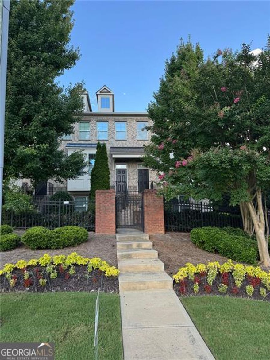 Impeccably maintained end-unit townhome offering an open floor plan with hardwoods, wood-finished accents, a cozy fireplace, and an abundance of natural light. Thoughtfully designed for the modern professional: a bright mini office perfect for remote work and a two-car garage equipped with an EV charging port. Set inside a secure gated community with pool, tennis courts and landscaped walking paths - pet friendly and low-maintenance living. Ideally located near State Bridge/Medlock Bridge with easy access to GA-141 and GA-400 for effortless commuting; minutes from top local dining and premier shopping. Enjoy an active community calendar highlighted by the Johns Creek International Festival and the Johns Creek Arts Festival - and many more seasonal events. A turnkey opportunity presented. MAY ALSO CONSIDER SALE!