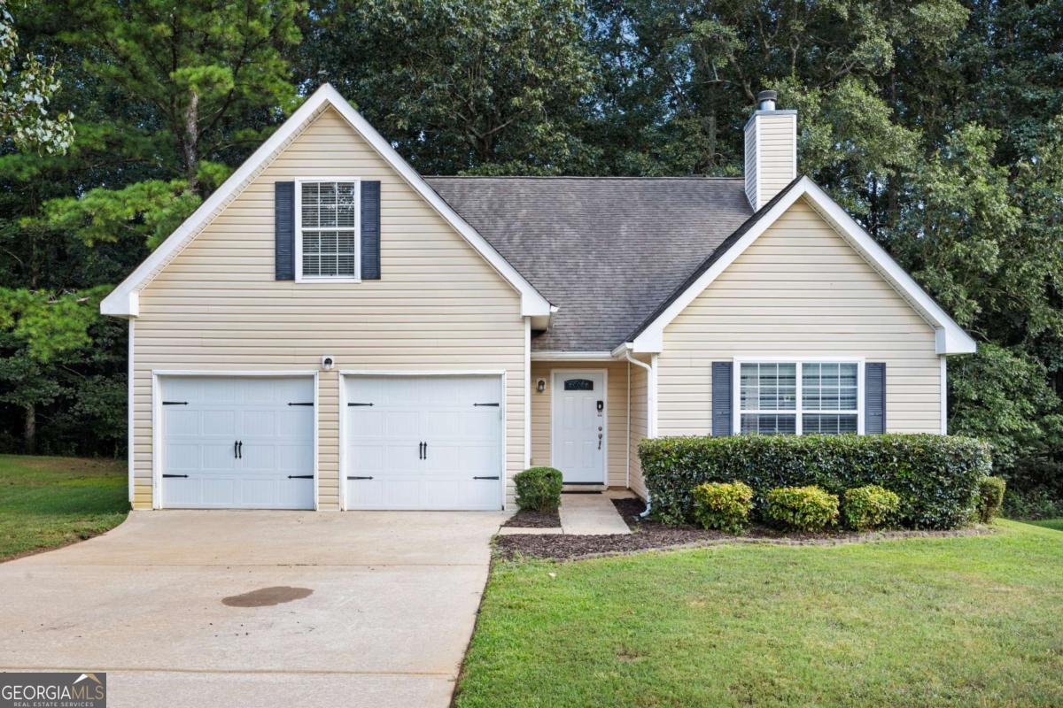 Welcome to 230 Cinnamon Oak Circle - Space, Comfort & Style in Covington! Located on a quiet cul-de-sac in a peaceful community with no HOA, this spacious and beautifully maintained 4 bedroom, 3 bathroom home is everything you've been looking for! With a flexible floor plan, stylish finishes, and room for everyone - this home truly has it all. Step into the inviting living room with hardwood floors and a cozy fireplace, perfect for movie nights or hosting friends. The kitchen features eye-catching stone flooring, ample cabinetry, and modern appliances - making it the heart of the home. You'll love the generously sized bedrooms, including a huge upstairs suite that's perfect for a guest room, teen retreat, or office. The primary bedroom offers brand new carpet, a private en-suite bathroom, and a serene atmosphere for rest and relaxation. Located just minutes from I-20, shopping, dining, and schools - this home combines comfort and convenience in one perfect package. Don't miss your chance to make 230 Cinnamon Oak Circle your forever home. Schedule your private tour today!