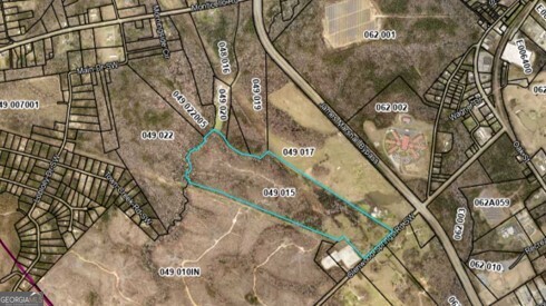 BACK ON MARKET: Surveyed at 95.25 acres with almost 836 ft of paved road frontage, this former family dairy is conveniently located just inside the city limits of Eatonton but feels like it's miles away. Shopping, dining and schools are close by and easy access to the 441 Bypass gets you quickly on your way to Madison, Milledgeville, Eatonton and Gray Hwy, Lake Oconee and Lake Sinclair. This property has so much potential for living, playing, sporting, or joining the popular homesteading lifestyle. Portions of the property are open pasture while the back of the property is wooded with a creek forming the back property line. Most of the pine has already been timbered but there are still plenty of pretty hardwoods that host plenty of deer and other wildlife. There are power lines across the back of the front third of the property but lots of wide-open space below it for grazing, gardening or riding ATVs. There is a 1216 sqft concrete block home that is not livable in its current state but with a little vision, could be brought back to life for a variety of purposes. If a hunting property is what you want, it could make a great bunkhouse or it could be used for any other farm or agricultural endeavor allowed by local zoning ordinances. Electricity, satellite, phone, a well, and 2 septic tanks are already on site. Or, take it all down and build a home that suits your style. This much agricultural land inside the city limits at this price is hard to find.