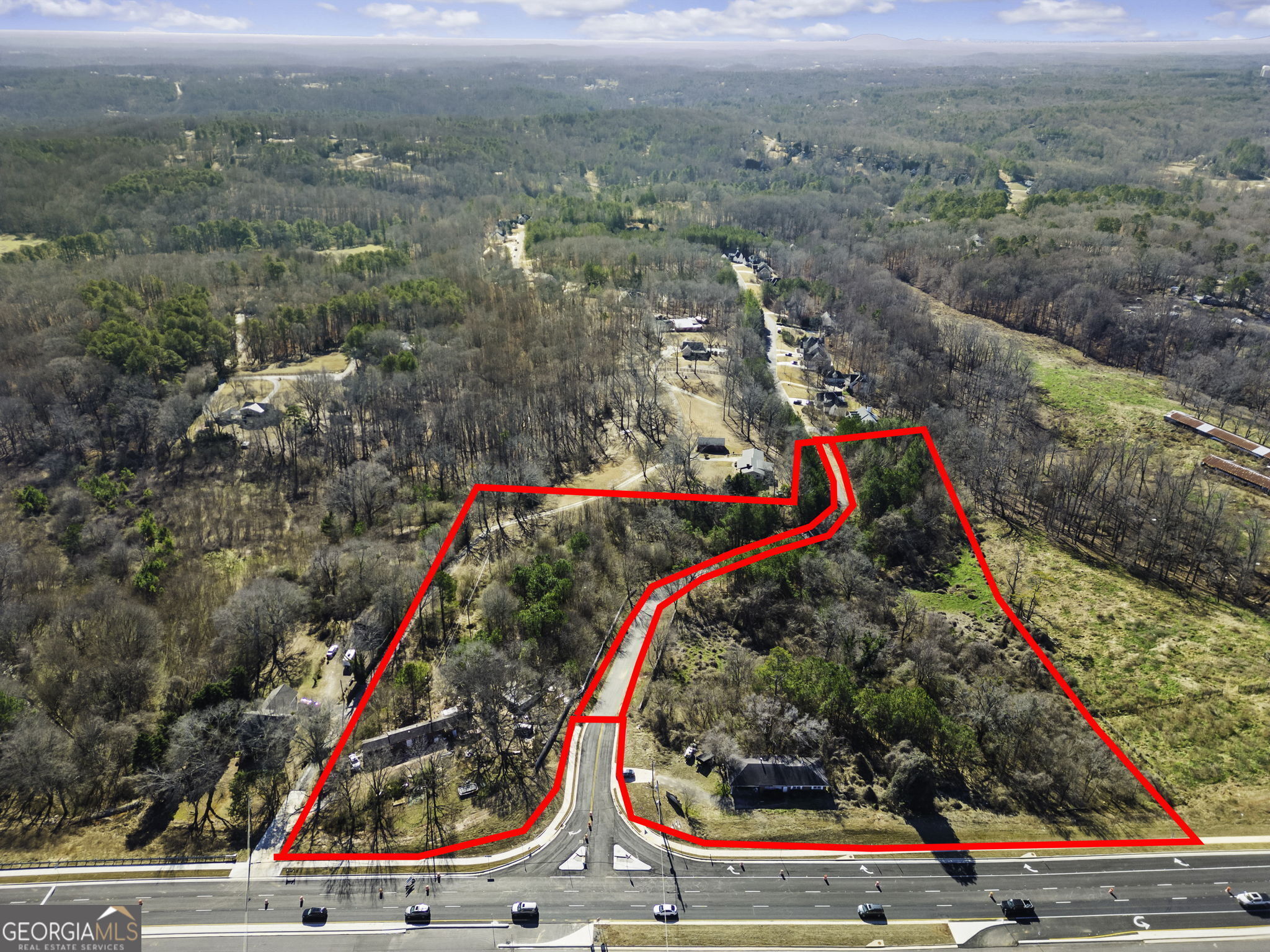 Includes both 3320 Cumming Highway & 3376 Cumming Highway. These two flat parcels would be perfect for Residential Development or Neighborhood Commercial!
