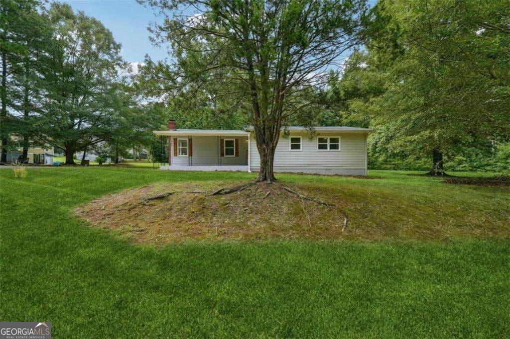 Photo of 309 Cowan Road SE, Conyers, GA 30094 (MLS # 10874594)