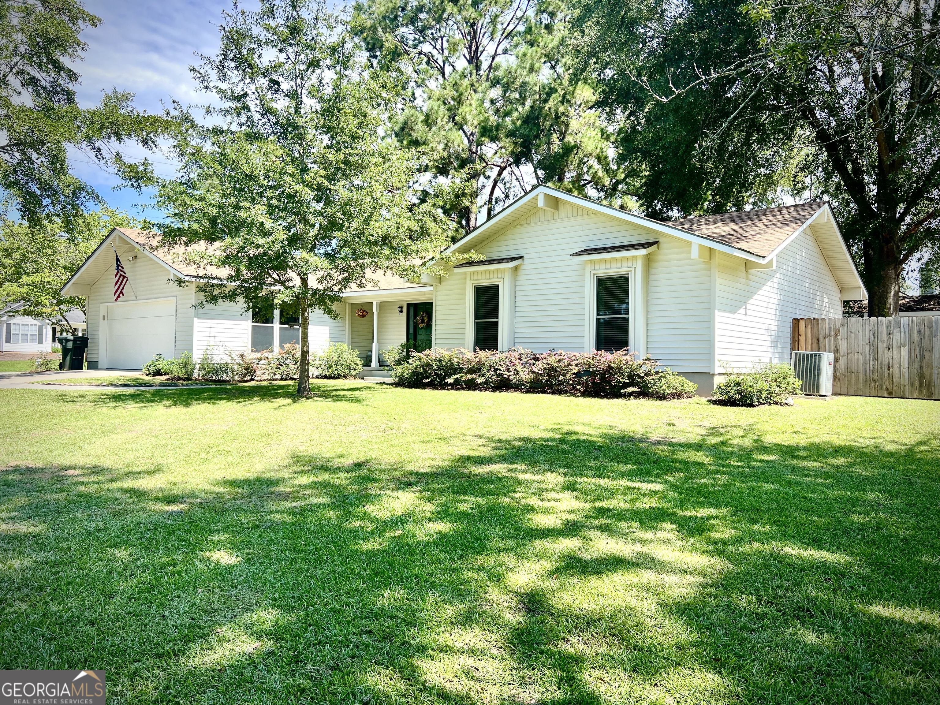 Welcome home to this adorable 4 bedroom, 2 bathroom ranch-style beauty in the desirable Kingswood Subdivision! Completely renovated inside and out, this home is truly move-in ready with a newer roof, HVAC, and hot water heater already in place - nothing left to do but unpack and enjoy. Step inside to a spacious great room with cozy fireplace, perfect for relaxing or entertaining. The home flows beautifully with fresh updates throughout, giving it that warm, inviting feel buyers love. Outside, you'll find a corner lot with privacy fence, a large storage building, and a double carport. The yard is beautifully landscaped, adding to the curb appeal, and the quiet neighborhood makes it even more special. Conveniently located close to shopping, restaurants, schools, and medical facilities, this home checks all the boxes for comfort and convenience. Cute as a bug, full of charm, and ready for its new owner! Don't miss your chance to see this one before it's gone!