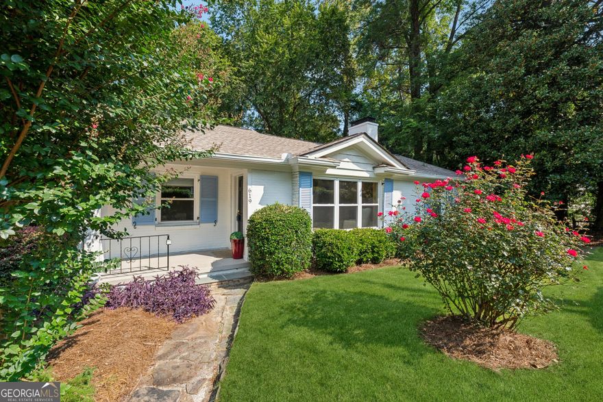 Welcome home to the heart of it all!  This 4-bedroom/4-bath gem with a basement is surrounded by professional landscaping and nestled in a wonderful Buckhead community zoned for award-winning schools.  Within minutes of the booming Westside, Midtown, Downtown, Atlantic Station, and I-75, you can live in the middle of Atlanta and walk to city parks, restaurants, and hotspots.  Step inside to experience the well-designed floor plan which features 2 primary suites on the main level.  The welcoming family room with a cozy brick fireplace has space for all your furniture.  The updated kitchen has gorgeous Jenn-Air appliances and maximizes space for countertops and storage. Three of the bedrooms can fit king-size beds, and no bedrooms share walls, which is a rare privacy feature. The meticulous owner has made countless improvements in recent years to blend the original charm with modern upgrades -- newer energy efficient windows, architectural shingle roof, Trane HVAC, lighting, bathroom vanities/fixtures, hardwood floors, carpet, water heater, and more.  Downstairs, the basement adds a world of space, with storage nooks and a fabulous entertainment lounge for hosting and family gatherings.  Don't forget the oversized walk-in laundry room with areas for folding and sorting.  Both levels have walk-out patios which overlook a grassy, level, fenced backyard and Channing Valley Park.  Parking is easy in the 1-car garage with bonus space and the 2 pads in the new driveway.  For outdoor enthusiasts, Bobby Jones Golf, Bitsy Grant Tennis, and the Northside Trail to the famous Atlanta Beltline are steps away.  What an incredible value in this sought-after intown neighborhood.  The long-time owner says that this has always been a happy home, and now it's time to make more joyous memories here.
