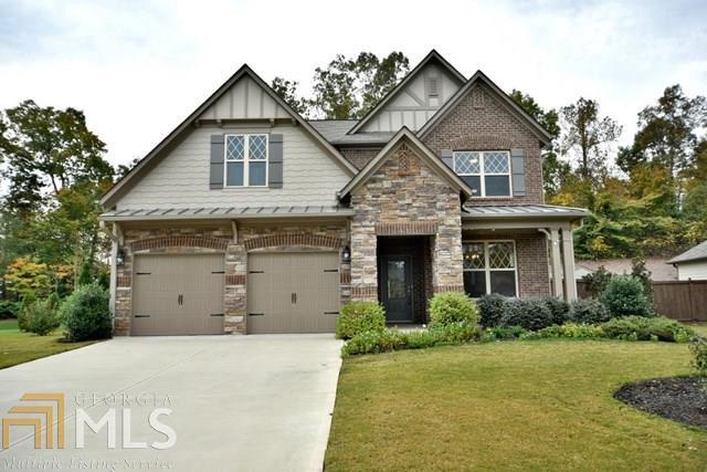 Great Floor plan has large Master with plenty of closet space, huge Loft, huge Kitchen w/Granite Island includes Stainless Appliances w/3 Door Refrig. Guest Bed & Bath on the main, Large 14x20 Patio, 8x10 Shed on concrete slab. Cul-De-Sac lot with a wonderful private, level, & wooded back yard. In the sought after Hampton Station, which boasts a park-like setting with pool, tennis, basketball and playground. Awesome community, great schools, walking distance to Food Store, Restaurants, Gas, Dry Cleaning & Bank. 7 Miles to future Northside Hospital and Big Retail Stores