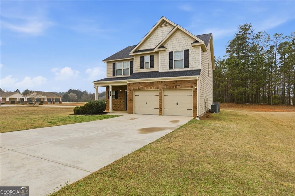 Photo of 395 Bandelier Circle, Hampton, GA 30228 (MLS # 10704163)