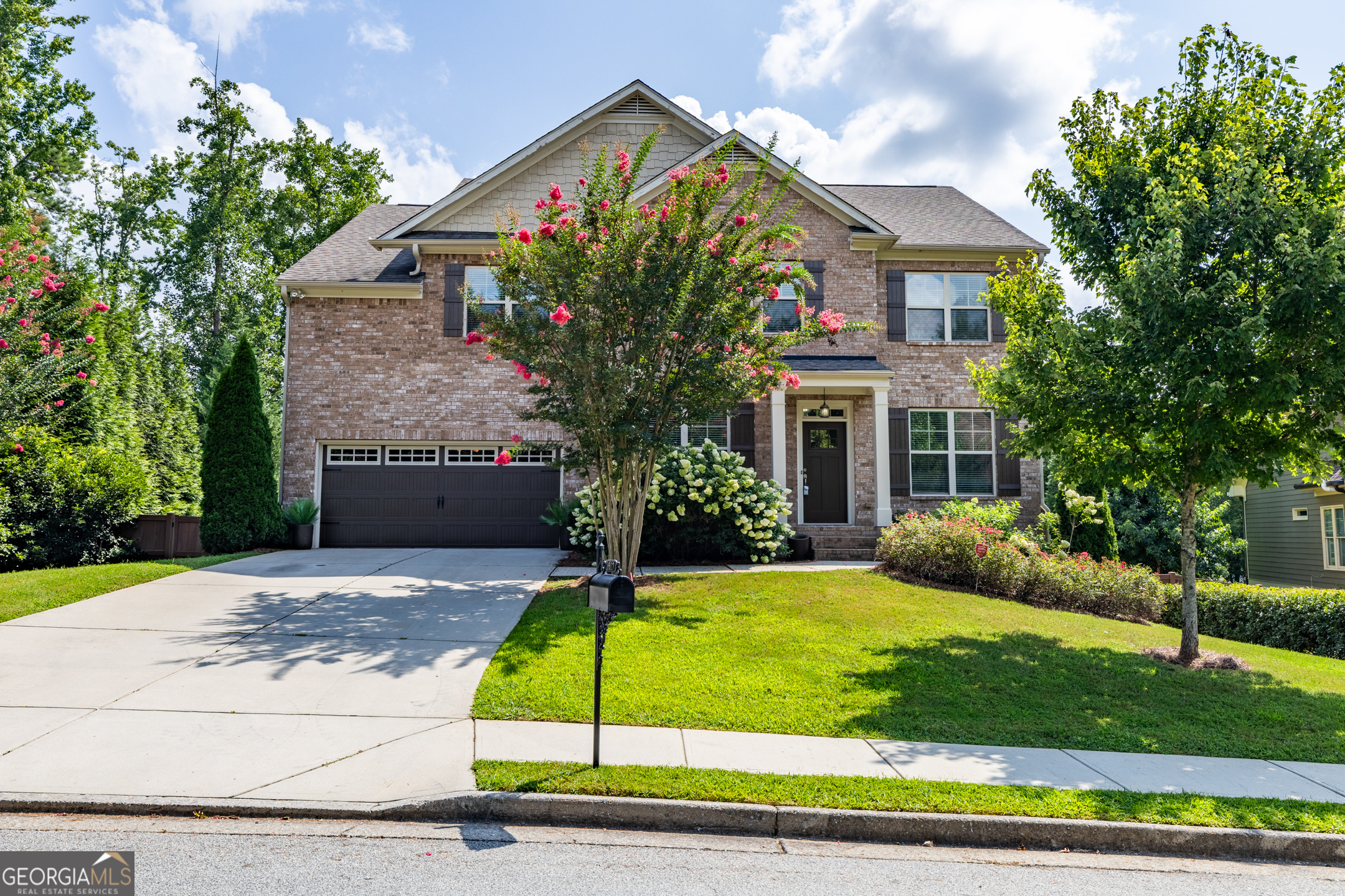 Welcome to this beautifully updated 5-bedroom, 3-bath home on the peaceful shores of Lake Lucile. Freshly painted enhances the spacious layout, which includes a formal dining room and a den with French doors-ideal for a home office or flex space. The main level also offers a bedroom and full bath for added convenience. Upstairs, the oversized primary suite features a private sitting area, a large ensuite bath with dual vanities, separate shower, and two walk-in closets. A large Bonus area and 3 secondary bedrooms, with shared bath, are also upstairs. The full unfinished basement offers endless potential for future expansion or storage. Enjoy tranquil lake views from the large deck just off the kitchen and living area-perfect for morning coffee, entertaining, or relaxing outdoors. With direct access to Lake Lucile, you can canoe, kayak, or fish right from your backyard. Conveniently located near parks, shopping, and major roadways, this home blends comfort, space, and natural beauty in sought-after Powder Springs.