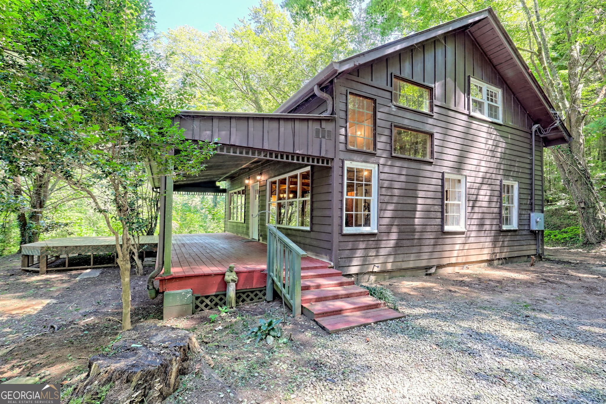 Welcome to your mountain retreat! This charming 3-bedroom, 2-bath cabin sits on 1.8 acres inside the city limits, offering both privacy and convenience. You'll be just minutes from the boutique shops and farm-to-table restaurants of downtown Clayton, with award-winning vineyards, hiking trails, and scenic waterfalls close by. Inside, you'll find an open-concept living space filled with wood finishes, natural light, and a welcoming atmosphere, perfect for relaxing or entertaining. With a little TLC, this cabin can truly shine and become your ideal mountain escape. Step outside to a peaceful setting where you can unwind, breathe in the fresh mountain air, and soak up the beauty of your surroundings. Conveniently located less than 5 miles from Rabun County schools, this home also offers easy access to nearby mountain towns-just a quick, scenic trip to Highlands or Cashiers, NC, and Helen, GA. For travel, you're only 2 hours from Atlanta, Greenville, or Asheville airports.