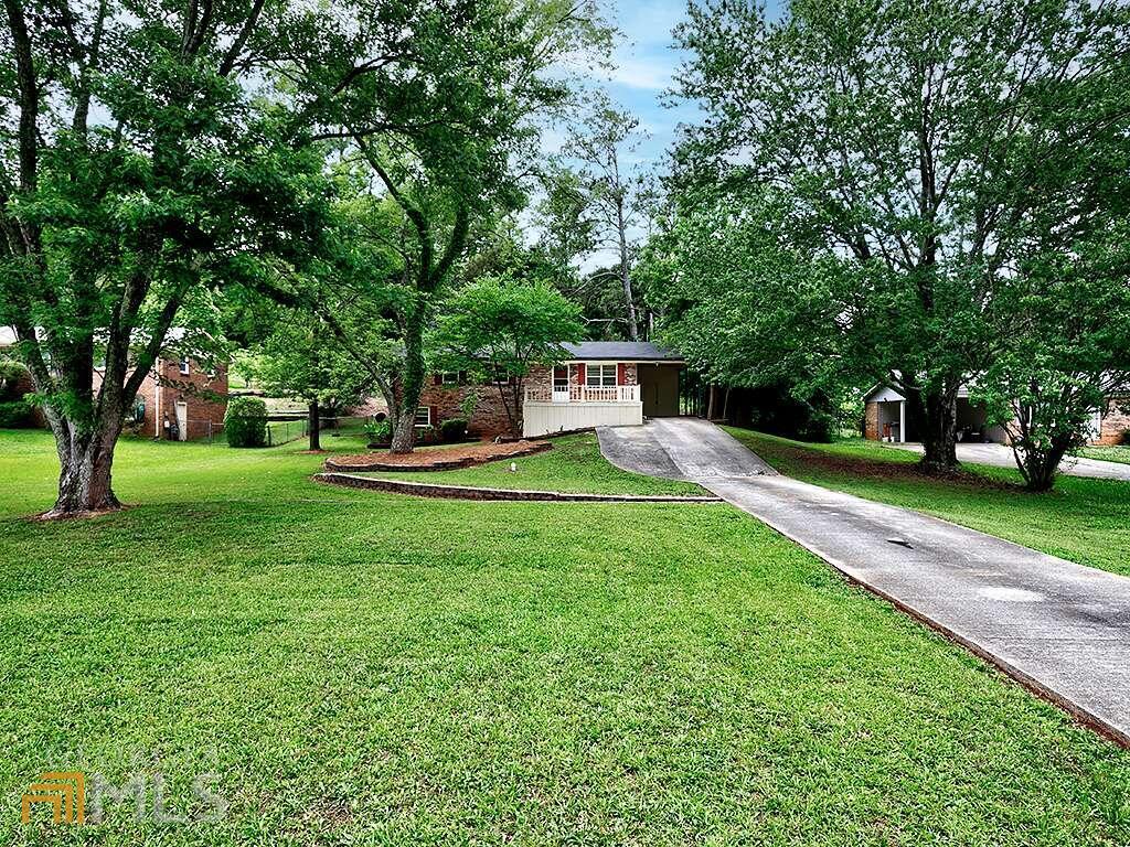 Recently Updated 3BR/1.5BA 4-Sides Brick Ranch Located Just Off Piedmont Road in Marietta/East Cobb. One Level Living with Dine-In Kitchen and Ample Cabinet Space Opening to Family Room with Newly Painted Front Deck Access. Fresh Paint Throughout and New Carpet in LR/BR's and New LVP Flooring in Kitchen/Dining and 1/2BA Plus New Lighting Throughout. Unfinished Daylight Basement with Freshly Painted Floor Adds Storage Space & Lots of Future Options. Large Lot with Huge Fenced Backyard and Storage Building. New HVAC Installed 2018. Excellent Location & School District Close to Shopping, Entertainment, Restaurants and More.