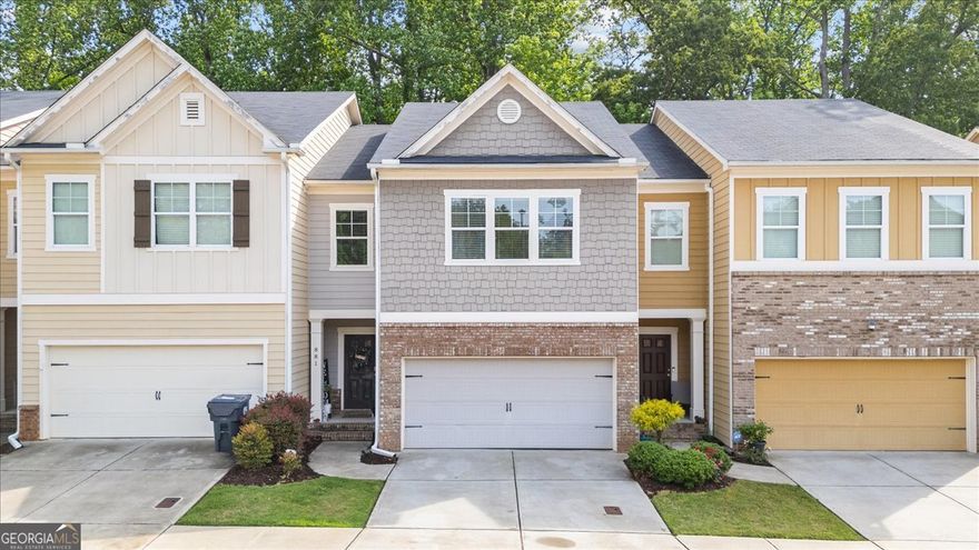 If convenience is what you're looking for, this Marietta townhome is exactly where you want to be-just minutes from Marietta Square, The Battery Atlanta/Truist Park, Kennesaw Mountain, and with easy access to I-75. This move-in ready home features fresh paint, new carpet, engineered hardwoods on the main level, and a fully finished basement with a bedroom and full bath-ideal for guests or a home office. The kitchen includes granite countertops, a walk-in pantry, and opens to the breakfast area and cozy family room with gas fireplace. Enjoy a private, level backyard with no rear neighbors. The owner's suite offers a sitting area and double vanity en suite, plus spacious secondary bedrooms with walk-in closets. HOA includes lawn maintenance.