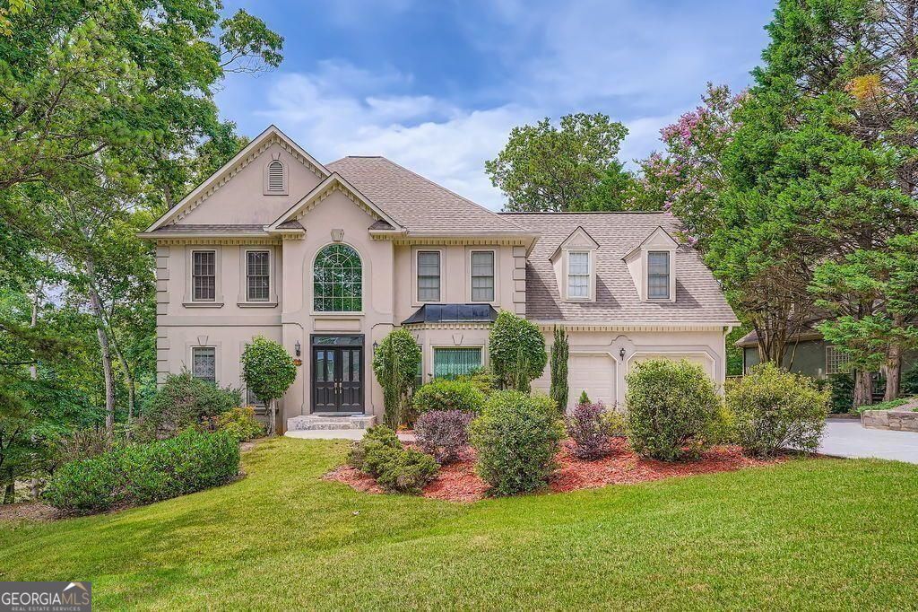 Welcome to 3314 Eagle Watch Drive - a beautifully updated 5-bedroom home with a bonus room, located in the sought-after Eagle Watch community of Woodstock, GA. Overlooking the Eagle Watch Golf Course, this home features a fully renovated kitchen (2021), brand-new carpet in all bedrooms and basement, freshly painted white interior walls, and a new HVAC unit. The finished basement offers flexible living space, and the bonus room is ideal for a home office, gym, or playroom. Additional recent upgrades include a new epoxy garage floor, freshly painted garage walls, and a newly painted deck. Step outside to a private backyard oasis with a pool and expansive double deck perfect for entertaining or relaxing. Located minutes from shopping, dining, Lake Allatoona, and I-575, and within a top-rated school district. Enjoy community amenities including golf, swim, tennis, and a clubhouse. This move-in-ready home offers modern updates, beautiful views, and an unbeatable location!