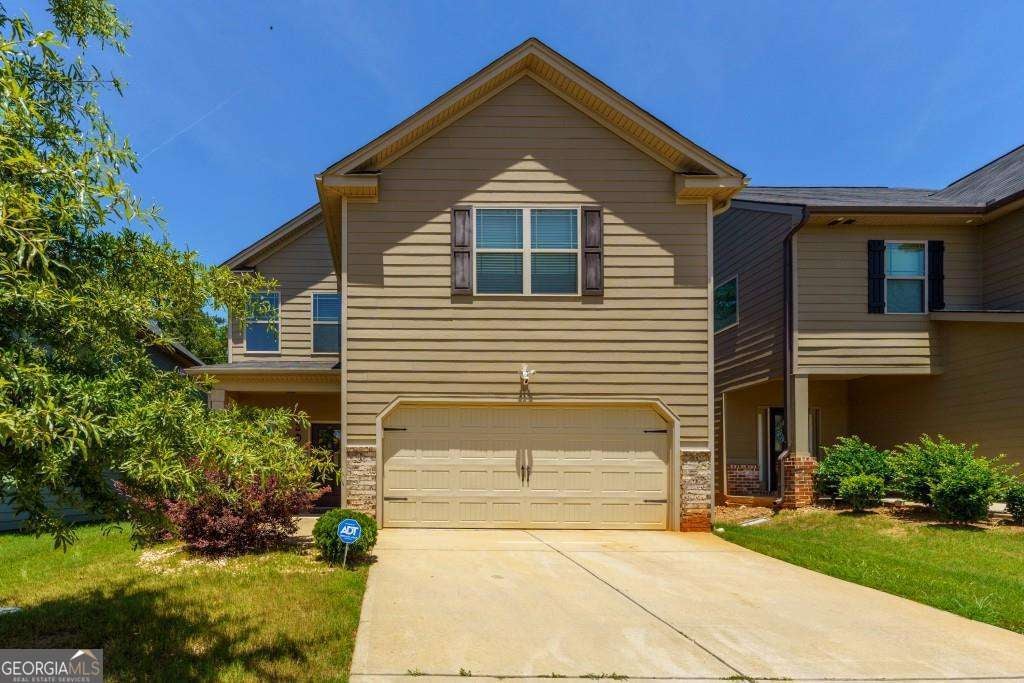 Photo of 209 Emporia Loop, Mcdonough, GA 30253 (MLS # 10808506)