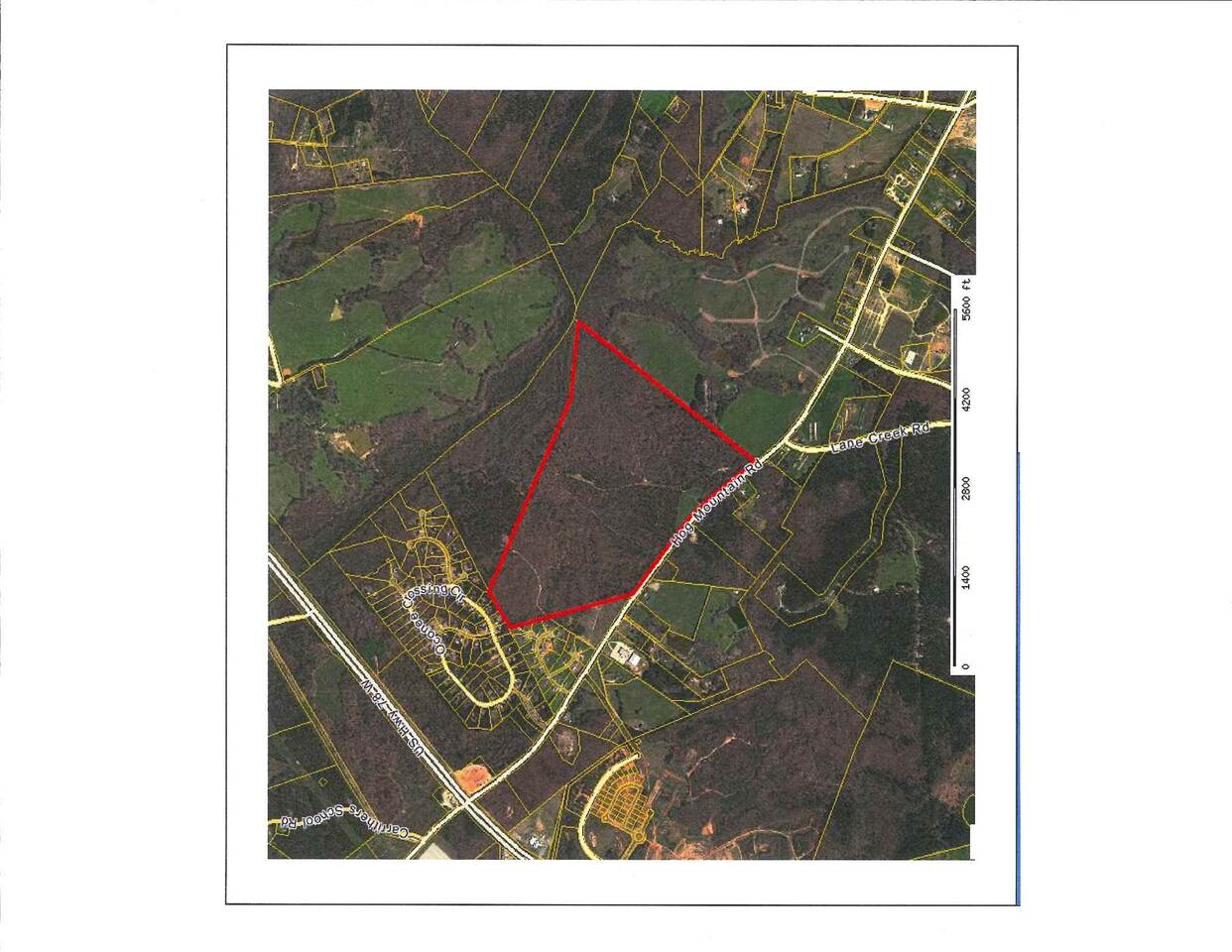 Price reduced! Large beautiful wooded tract! This 233 acre tract with 7/10 ths of a mile of frontage on Hwy 53 would make an excellent subdivision. It is conveinient to schools and the growing Hwy 78 corridor. This tract may be purchased as a single tract or the owner will consider partial take-downs to a single buyer purchasing the property. It is currently in the Land Conservation Use program. Most of this tract is heavily wooded and has significant timber value. Being one of the larger acreage tracts on Hwy 53 (Hog Mountain Road) it represents an incredible opportunity for the right investor.