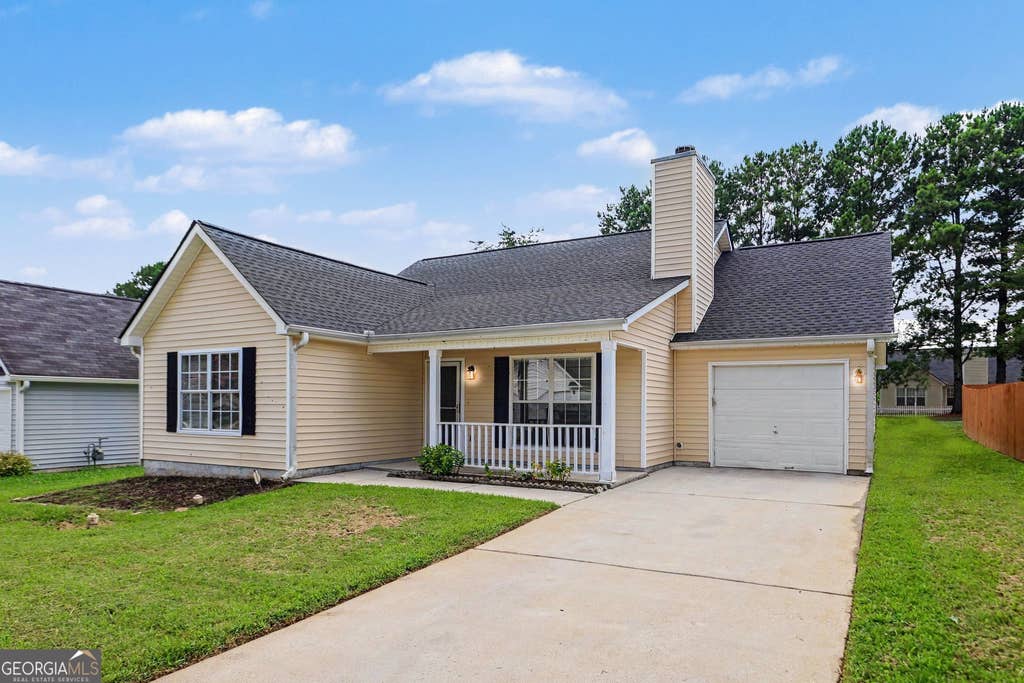 Photo of 9009 Highland Pass, Fairburn, GA 30213 (MLS # 10817422)