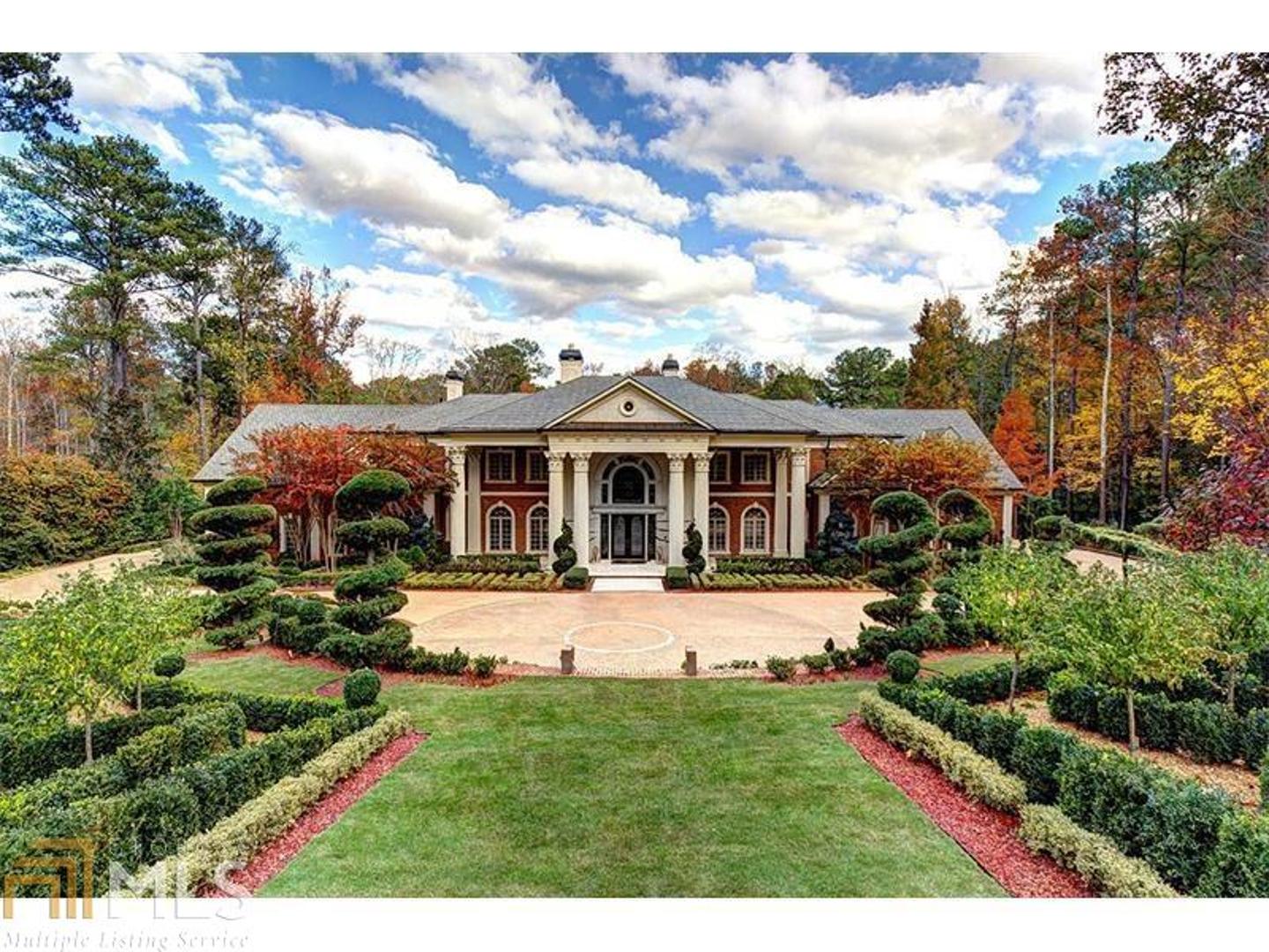 Conceived for entertaining on a grand scale, this exquisite estate beckons at Chateau De L’Imaginaire. Poised for future filming opportunities, your estate has already had a starring role in many Hollywood productions. The interior and exterior beg to be shown-off, from manicured gardens designed by an internationally-acclaimed landscape architect to the lavishly sprawling inside. For the avid collector, a 25-car motor court and 6-car garage are ideally-suited for putting your collection on display. A grand entry and two-story great room/ballroom will awe your guests from the moment they arrive. Two commercial-grade kitchens keep guests sated, yet also function beautifully for everyday living. Relish Atlanta's temperate climate from your magnificent outdoor space and admire the artful beauty of the landscape. A gorgeous saltwater pool surrounded by a resort-style sundeck is a perfect setting for alfresco entertaining. With a sought-after location in the affluent Buckhead community, not to mention close proximity to Whitewater Creek Trail for pristine hiking, biking, and walking paths, 4455 Harris Trail NW is one of Atlanta's most luxurious estates.