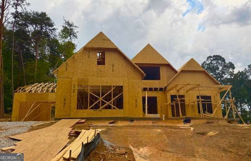 UNDER CONSTRUCTION! The Evans B is a beautiful open-concept floor plan featuring 4 bedrooms - with 2 on the main level. The charming craftsman-style exterior welcomes you home with its architectural details and double-pane wood windows throughout. A 4-car garage provides ample parking and storage. Enjoy a spacious kitchen with a large island and open views of the family room, keeping you at the center of the activity. The master suite boasts a large shower and an expansive walk-in closet. The vaulted family room includes built-in bookcases and a cozy wood-burning fireplace, with hardwood floors throughout the main level. Upstairs, you'll find two generously sized secondary bedrooms, each with its own private bathroom, plus lots of storage and a finished room over the garage. his home is currently under Construction, with estimated completion date scheduled for February 2026. All our homes come with 1 year builder warranty, providing peace of mind as you embark on the home ownership journey. Beautiful home and amazing community. Bercher Homes says it best. Great Homes Great Life.