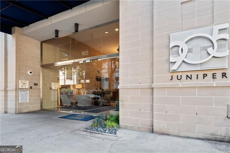 Welcome to 905 Juniper St! The best boutique condo building in Midtown! This fully furnished, sun light filled studio home features an open concept with stained concrete floors, high ceilings, electric induction cooktop, and beautiful kitchen workspace. The fully remodeled bath has spa like shower features. Meile washer and dryer provided. The building has full amenities including a fitness center, club room, and exceptional Concierge service. Excellent building security systems along with 1 assigned and covered parking space, along with complimentary guest parking. The home has fabulous walkability to Piedmont Park, Beltline, Marta train station, countless restaurants and nightlife, High Museum, Alliance Theater, Colony Square, and much more!