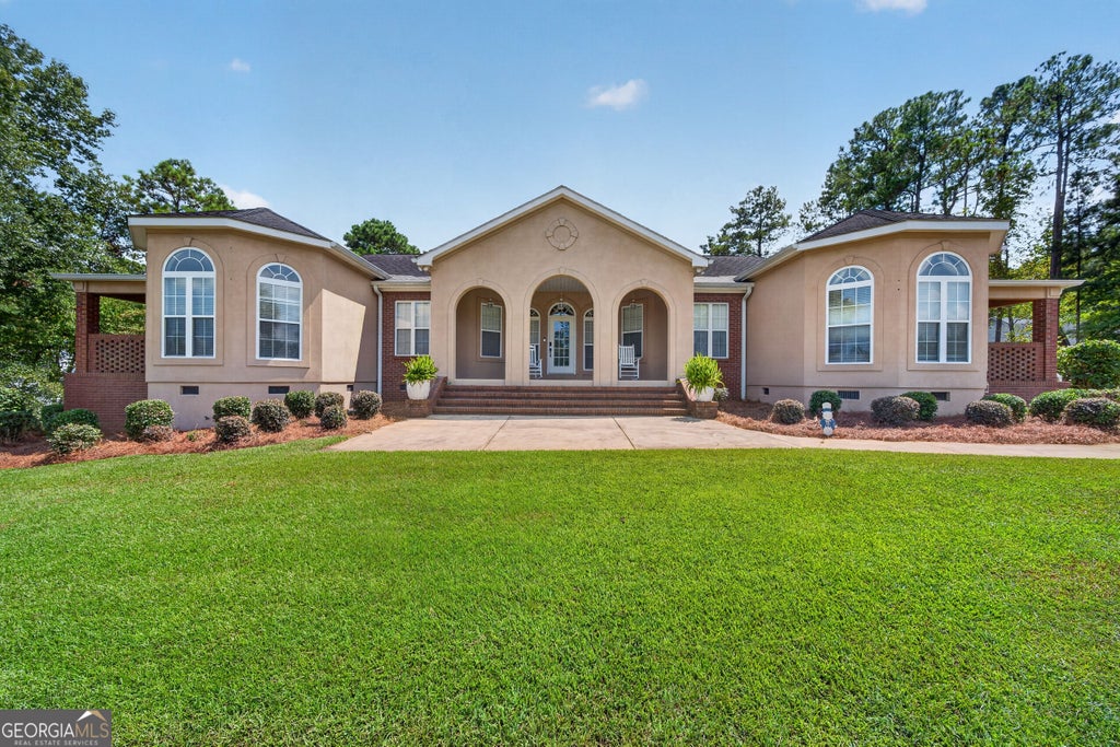 Photo of 103 Waters Edge Drive NE, Milledgeville, GA 31061 (MLS # 10841098)