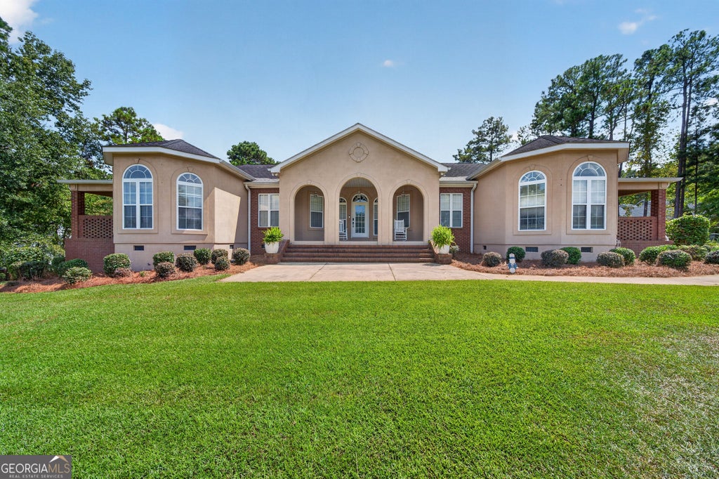 Photo of 103 Waters Edge Drive NE, Milledgeville, GA 31061 (MLS # 10841098)