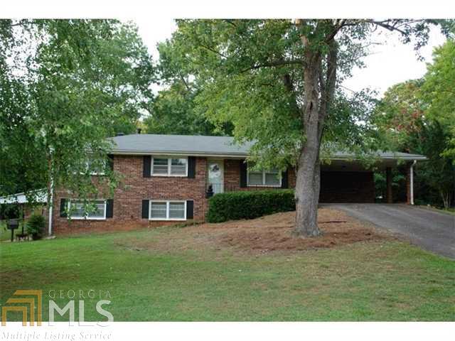 Hard to find a 4 sided brick ranch on a basement! Cul-de-sac lot. Hardwoods throughout much of the main level and under the bedroom carpet! Would be beautiful carpet was removed and floors refinished. Full basement is partially finished. Very large lot with plenty of yard. Covered patio off of basement. Abundance of kitchen cabinets!