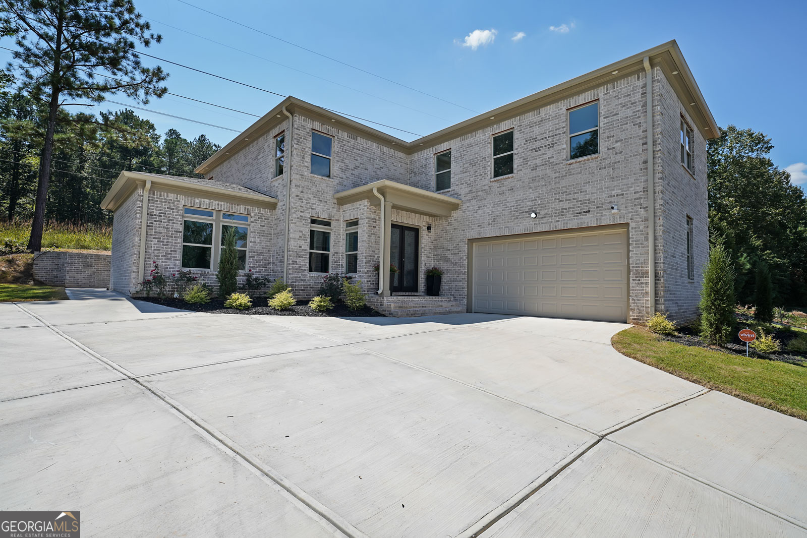 New construction in a quiet, established neighborhood, this spacious 4BR/4.5BA home blends modern style with everyday function, featuring a main-level bedroom suite and an upper-level loft. The kitchen showcases stainless steel appliances and quartz countertops, with granite in all bathrooms, and durable luxury vinyl plank and hardwood flooring throughout. Each bedroom offers generous closet space, tank-less water heater, and the garage includes a built-in EV charging station-perfect for electric-vehicle owners. Thoughtfully designed and move-in ready-schedule your showing today. Closing cost assistance available with preferred lender.