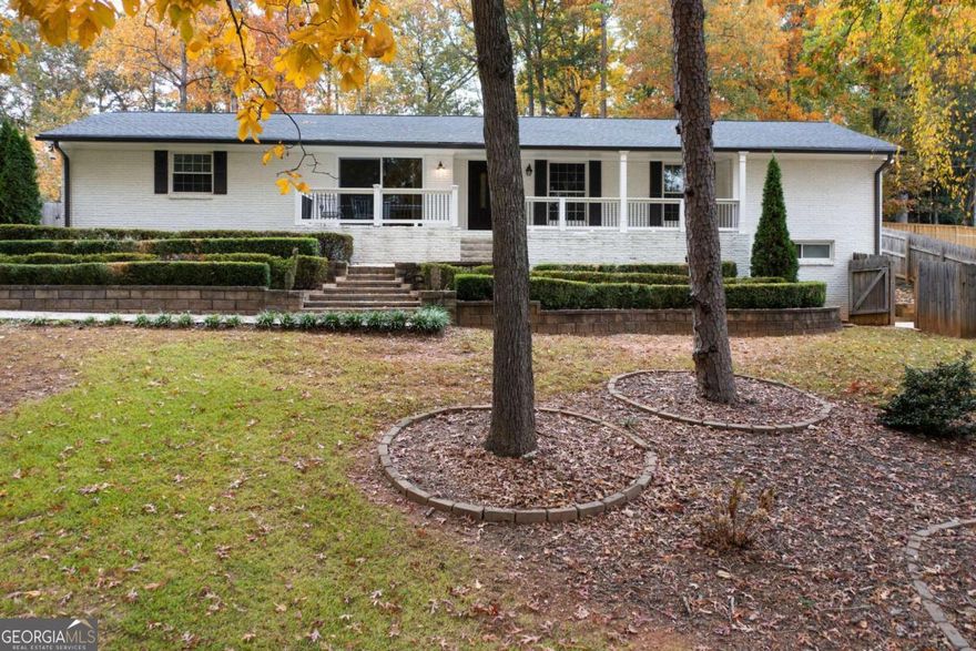 Welcome to this beautifully renovated four-side brick ranch in Sandy Spring's highly desirable Spalding Woods community. Originally built in 1966, this classic home now blends timeless character with modern comfort. Inside, you'll find freshly refinished hardwood floors throughout, brand new interior paint, and an updated kitchen complete with a spacious granite island and stainless steel appliances-perfect for everyday cooking or entertaining.    Step outside and enjoy your private fenced backyard featuring a sparkling saltwater pool-ideal for relaxing, gatherings with friends, or summer fun. There's also an outbuilding that provides extra storage or a workshop space.    An incredible opportunity to own in one of Atlanta's most convenient locations-just minutes to GA-400, I-285, Roswell Road, shopping, dining, and more. This move-in ready home offers both comfort and convenience in a neighborhood you'll love calling home.