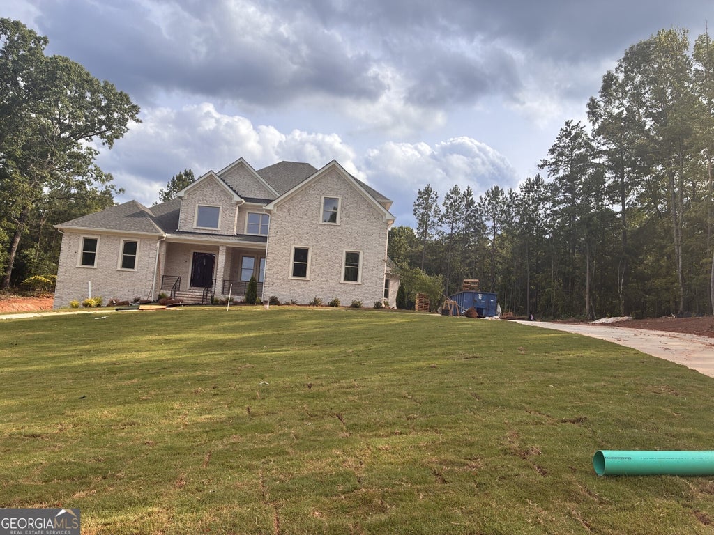 Photo of 304 Queenscastle Drive, Ellenwood, GA 30294 (MLS # 10797520)