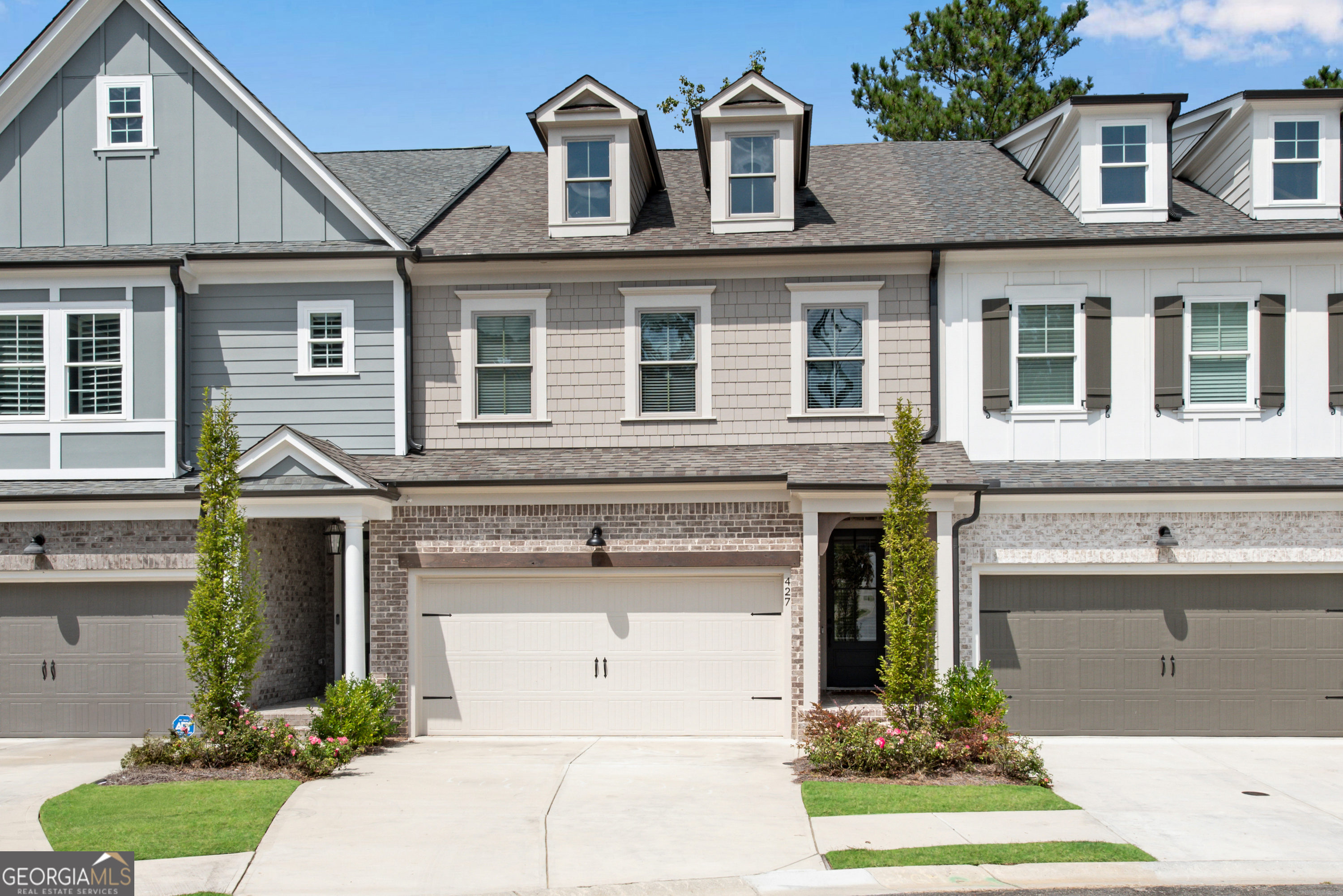 Like new and loaded with upgrades! This thoughtfully designed home is on a quiet cul-de-sac with a wooded backdrop, offering both privacy and beauty. The gourmet kitchen is a true centerpiece, showcasing a large entertaining island, quartz countertops, a walk-in pantry, soft-close cabinetry, an upgraded oven and stove, and the convenience of a pot filler. Flowing seamlessly into the family room with its inviting fireplace, the open floorplan extends to a stained and sealed rear deck that overlooks the private, aluminum-fenced backyard. The upper level is a treat! You'll love the spacious owner's suite complete with a comfortable sitting area and a luxurious bath featuring a huge walk-in shower, an oversized soaking tub with a pedestal faucet, and an overhead shower and generous master closet. A dedicated office with a pocket door and custom built-in desk provides the perfect space for working from home. The secondary bedroom is large with a walk in closet and a beautiful en suite bathroom. The terrace level extends the home's versatility with a guest bedroom, full bath, and a bonus or media room enhanced by a 120-inch movie screen and an overhead projector wiring package. Every detail reflects quality craftsmanship, from the rich hardwood flooring on the main level, stairs, and upstairs hallway, to the upgraded window and door trim package, solid core doors, and custom blinds. The home if fully wired with CAT 7 for seamless connectivity and includes additional thoughtful touches such as multiple garage outlets and overhead storage racks. Full of natural light with high ceilings throughout, this home blends elegance, comfort, and modern convenience! Close to shopping, schools, and all the fun in downtown Canton. Come see this one soon!