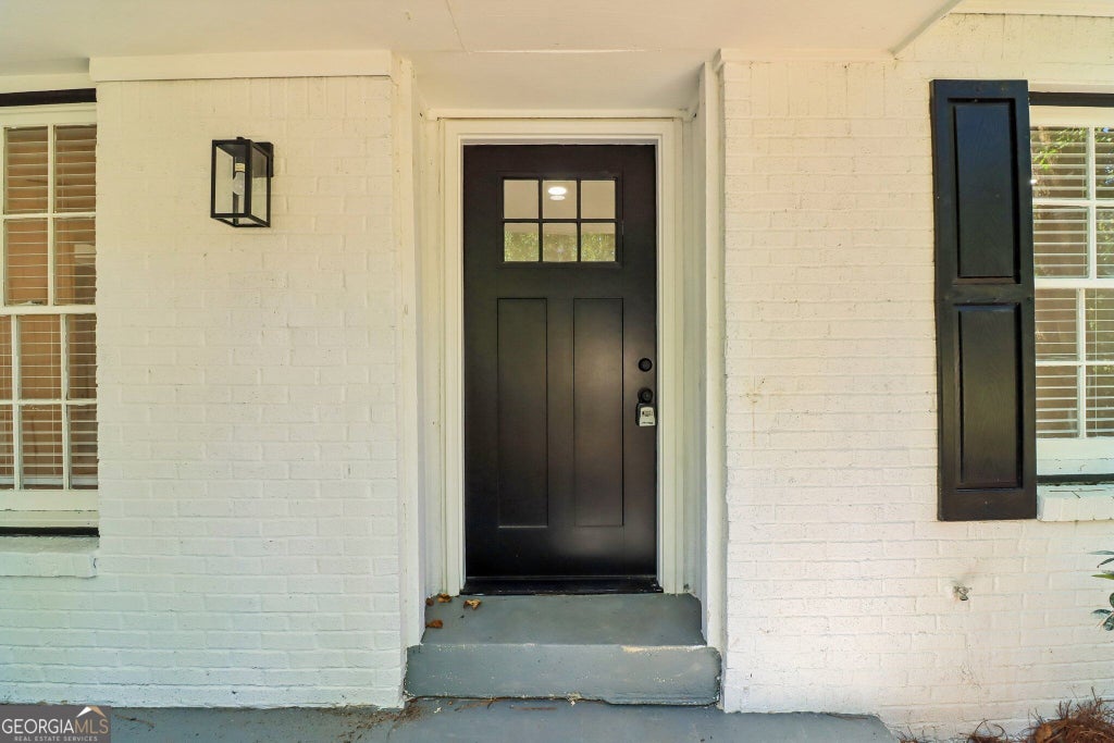 Photo of 837 Hemingway Road, Stone Mountain, GA 30088 (MLS # 10872912)