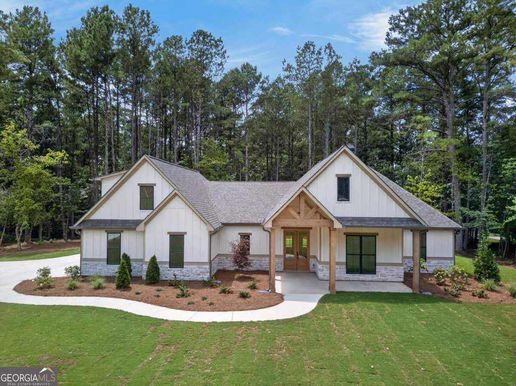 Photo of 7704 Georgia Highway 100 Road, Buchanan, GA 30113 (MLS # 10829768)