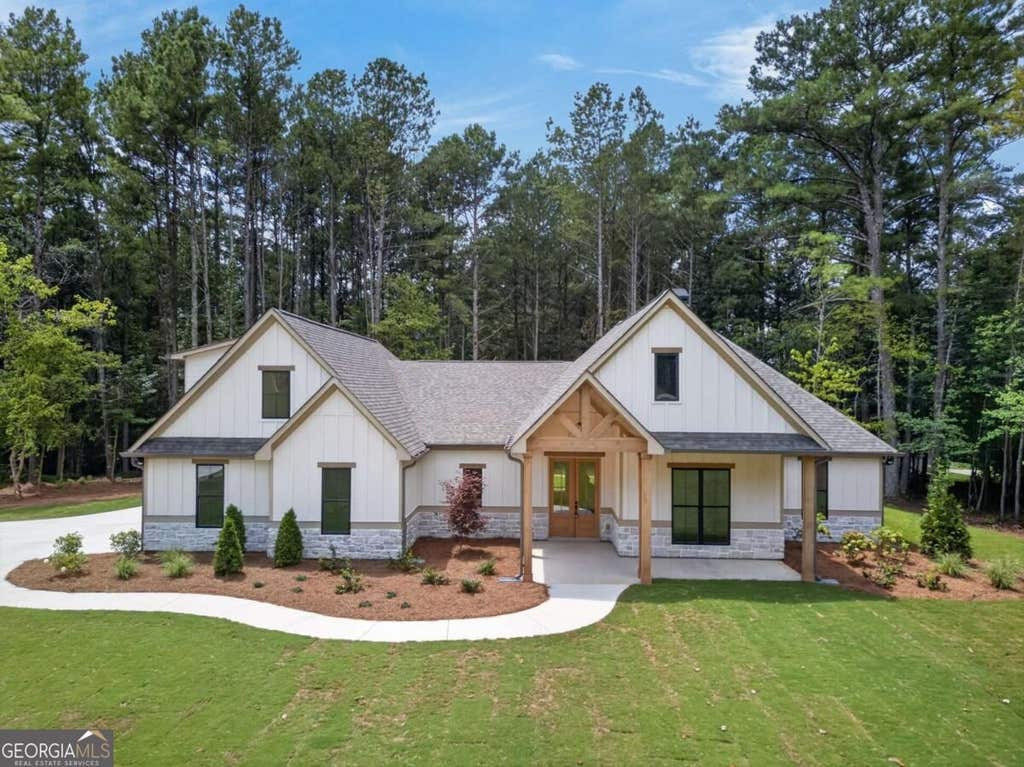 Photo of 7704 Georgia Highway 100 Road, Buchanan, GA 30113 (MLS # 10829768)