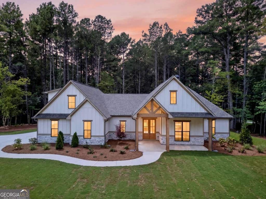 Photo of 7704 Georgia Highway 100 Road, Buchanan, GA 30113 (MLS # 10829768)