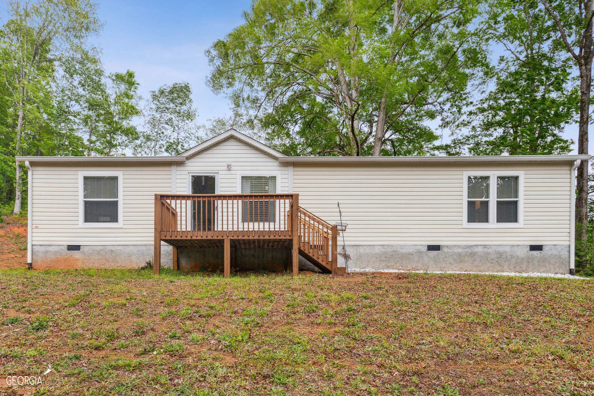 Welcome home to the best of country living! Comfort and privacy welcomes you home on this 1.47 acre lot with your home set back from the road, overlooking the pastures behind you. Beautiful open-planned, one level living with ideal floor plan. Master with huge en-suite with double vanities, separate shower and large soaking tub. Two additional bedrooms share a second bathroom. Enjoy the flow of easy entertaining with a lovely kitchen island overlooking your living room and a pantry made for Costco shopping! Mudroom off of back entrance with laundry room. Partially fenced back yard. A must see at a very rare price point!