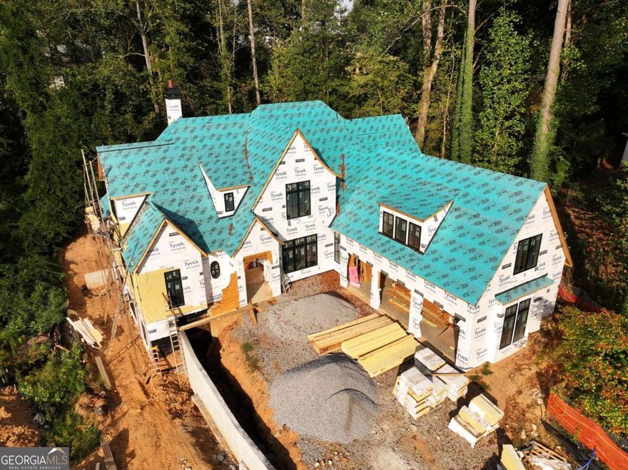 Luxury new construction being built by award-winning Loudermilk Homes in the exclusive and private new 11-home enclave, Blue Heron Walk. This highly sought-after Buckhead location is just minutes to offices, shopping, restaurants, and major highways, yet steps away from the Blue Heron Nature Preserve urban forest featuring 30 acres of natural woodlands and miles of walking trails. This exceptional residence has a modern and thoughtfully designed floor plan with 11 ft ceilings on the main and 10 ft ceilings upstairs. Highlights include 5 en-suite bedrooms with the primary suite on the main level, a loft and bonus room upstairs, gourmet chef's kitchen, home office, large unfinished basement, 3-car garage, and nice walk out first floor yard with covered patio. With light-filled rooms and walking distance from its cul de sac lot to Blue Heron Preserve, this home embraces luxury and nature.