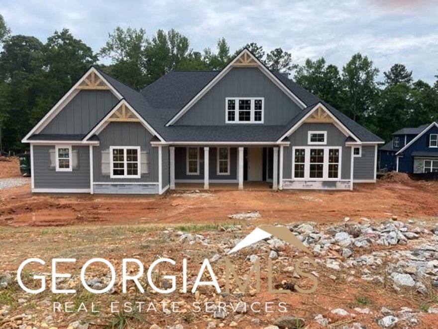 New Costruction - Ready in November!  4 bedroom ranch with expanded 2 car garage. Don't miss out on this Riverwalk Plan by New Leaf Homes on a wooded acre lot. Large plan with bonus room. Hardwoods throughout main living areas, Quartz countertops throughout, white cabinets,  stone fireplace and more!  Huge bonus/flex space rooms upstairs. Large covered back porch over looking . Community Clubhouse with Pool, 24 hour fitness, 2 Lakes, boat storage area. close to Trilth studios, Piedmont Hospital and a short compute to Atl Airport. Resort style living. ALL Selections have been made & ordered. NO changes accepted. $3000 towards closing costs with Preferred Lender- ask for details.