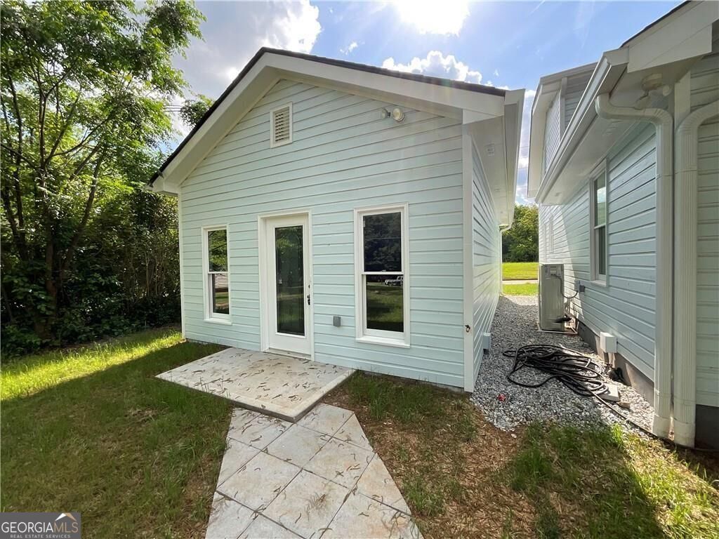 Photo of 5191 Emory Street NW, Covington, GA 30014 (MLS # 10846487)
