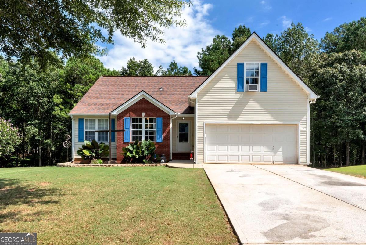 Charming Ranch in Cherokee Bluff School District This beautifully maintained ranch home offers the perfect blend of comfort and versatility. Featuring 3 bedrooms and 2 bathrooms, there's plenty of space to suit your needs. The finished basement, featuring a private entrance, provides endless possibilities-ideal for guests, multigenerational living, or potential rental income. It features a bedroom, full bathroom, kitchen, family room, and flexible space. Sitting on over an acre of land, the home's outdoor living is just as inviting, with a spacious deck and covered patio that extend your living area into the fresh air.