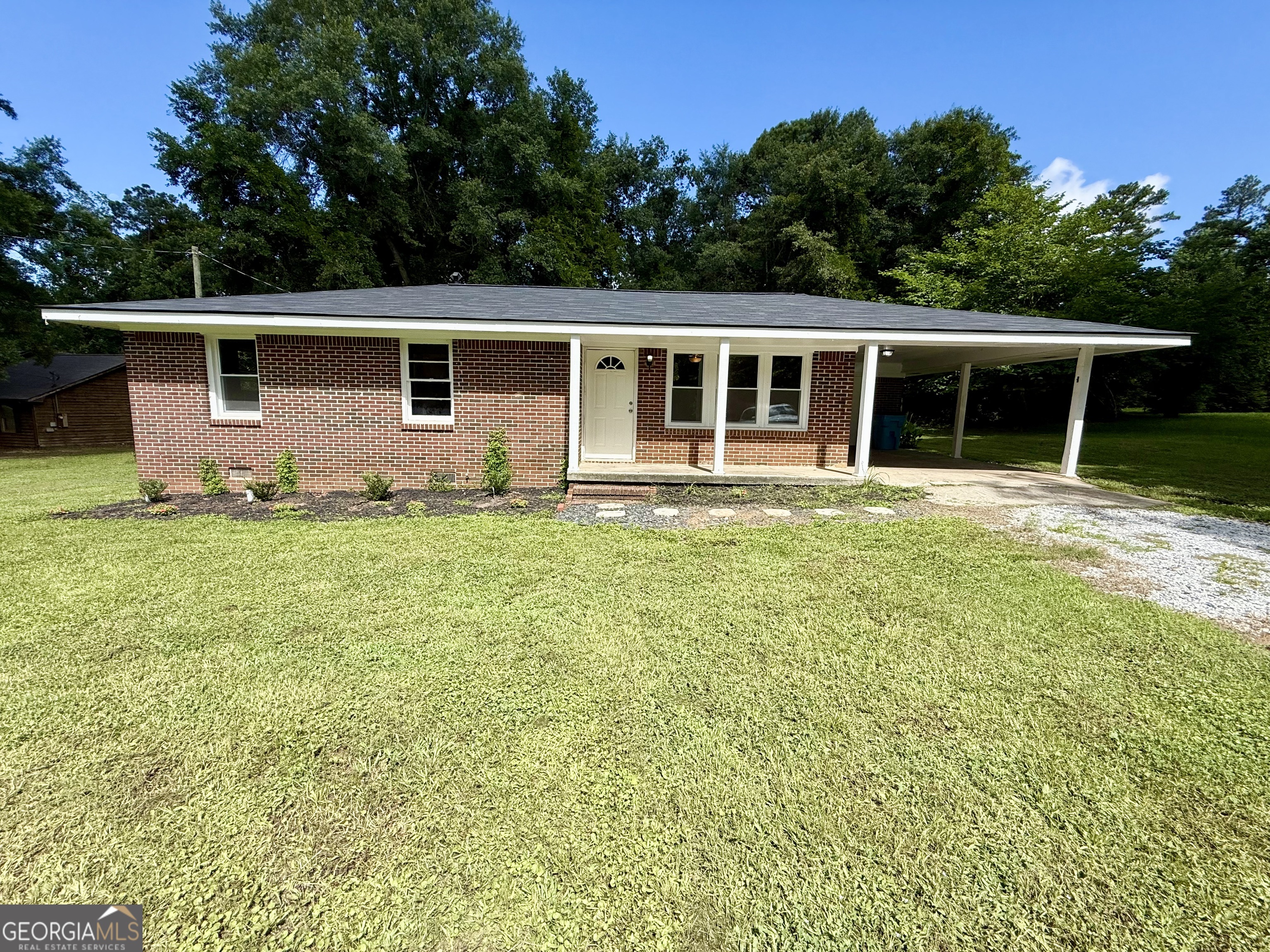 All-Brick Ranch, Modern Upgrades, No HOA, and Peaceful Country Living! Discover the perfect blend of style, comfort, and freedom in this beautifully remodeled all-brick ranch. This 3-bedroom, 1-bath home has been thoughtfully updated and sits on a spacious, well-maintained lot that offers both privacy and room to breathe, all without the restrictions of a subdivision or HOA. Inside, you'll find luxury vinyl plank wood flooring throughout, offering both durability and elegance. The home features a new roof and water heater, ensuring worry-free living.Step outside into your picturesque yard, ideal for gardening, outdoor entertaining, or simply enjoying the quiet serenity of country living. Whether you're sipping your morning coffee on the porch or hosting a backyard barbecue, this home makes it easy to enjoy the outdoors. Perfectly suited for a relaxed, laid-back lifestyle, this property offers the freedom to personalize and use your land your way. Bring your pets, plant a garden, or use the workshop for something you've always wanted. Located just minutes from local shopping, dining, parks, and schools, yet far enough away to feel like your own retreat, this home offers the best of both worlds: peaceful rural living with everyday conveniences nearby. Don't miss your chance to own this turnkey gem with timeless charm and modern comfort. Schedule your private tour today!