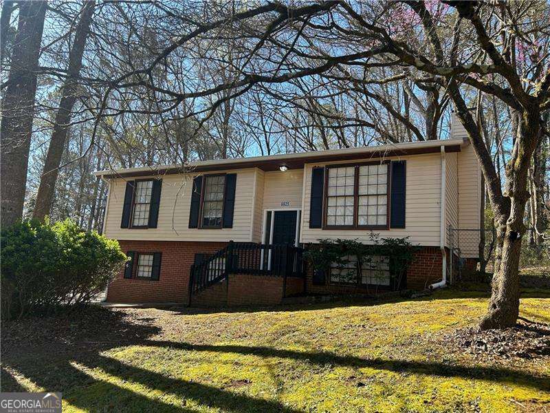 This 4 bedroom and 2 full bath home is a fantastic opportunity for first-time home buyers or anyone looking to add their personal touch. This is a solid and functional home with plenty of potential just waiting to become your dream space. Plenty of parking with a two car garage plus an extra parking pad. This home also has a bonus room or possible fourth bedroom in the lower level.