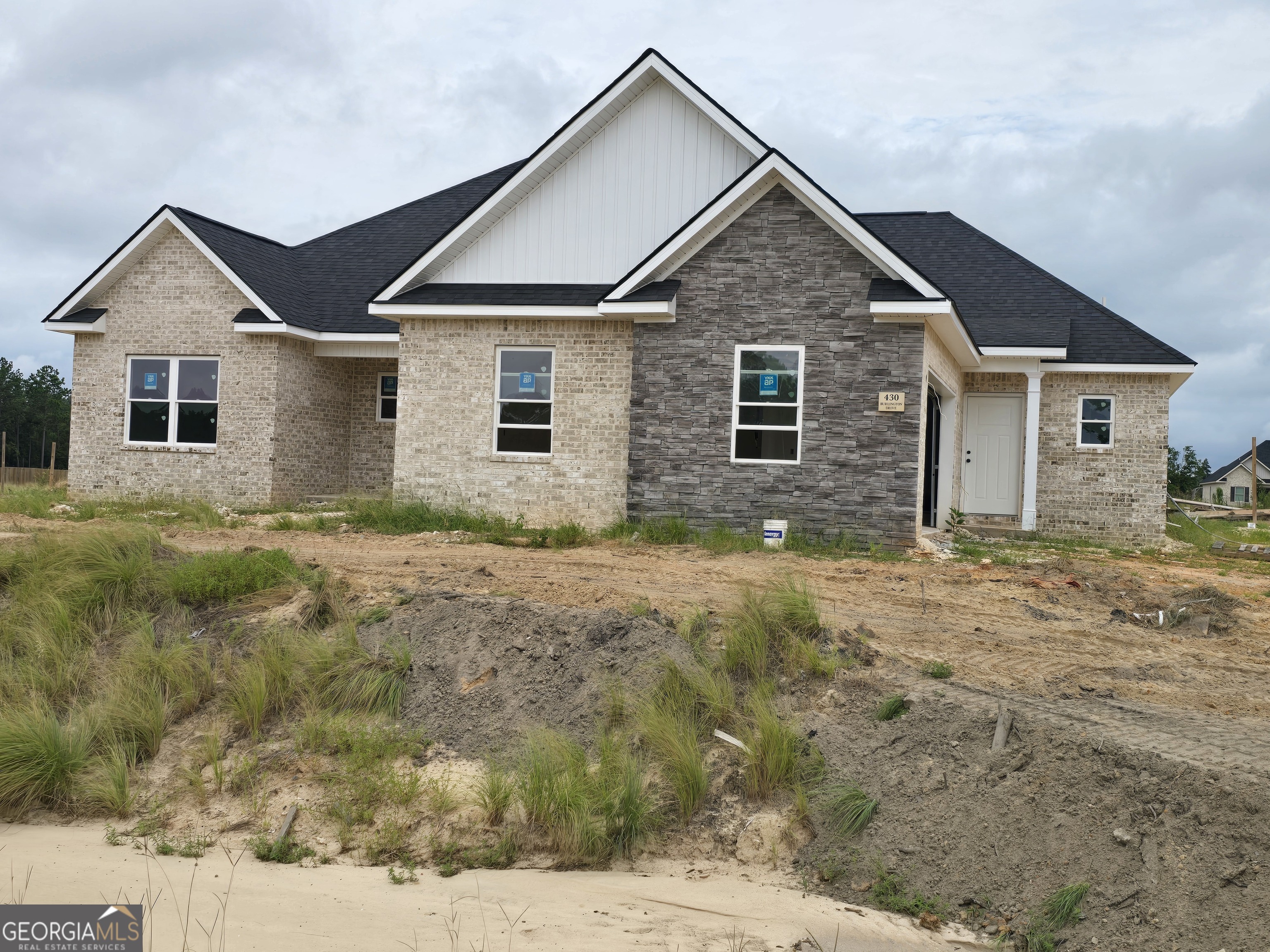 Beautiful New Construction Home - Perfectly Located Between Warner Robins & Macon! Welcome to this stunning 1-story, 4-bedroom, 2.5-bath new construction home offering 2332 sq ft of thoughtfully designed living space. Nestled in a prime location between Warner Robins and Macon, this home combines style, comfort, and convenience. Step inside to find luxury vinyl plank (LVP) flooring throughout the main common areas, plush carpeting in the bedrooms for cozy comfort, and durable tile in all wet areas for easy maintenance. The heart of the home is a spacious kitchen featuring stainless steel appliances, a large island, and a cozy breakfast area, ideal for morning coffee or casual meals. The split floorplan offers privacy and functionality, with the primary suite conveniently located on the main level, complete with a well-appointed en-suite bath. You'll find three additional bedrooms and a full bath-perfect for family, guests, or a home office setup. With its modern finishes, open layout, and unbeatable location, this home offers the perfect blend of suburban tranquility and city access. Don't miss your opportunity to make this beautiful space your own!