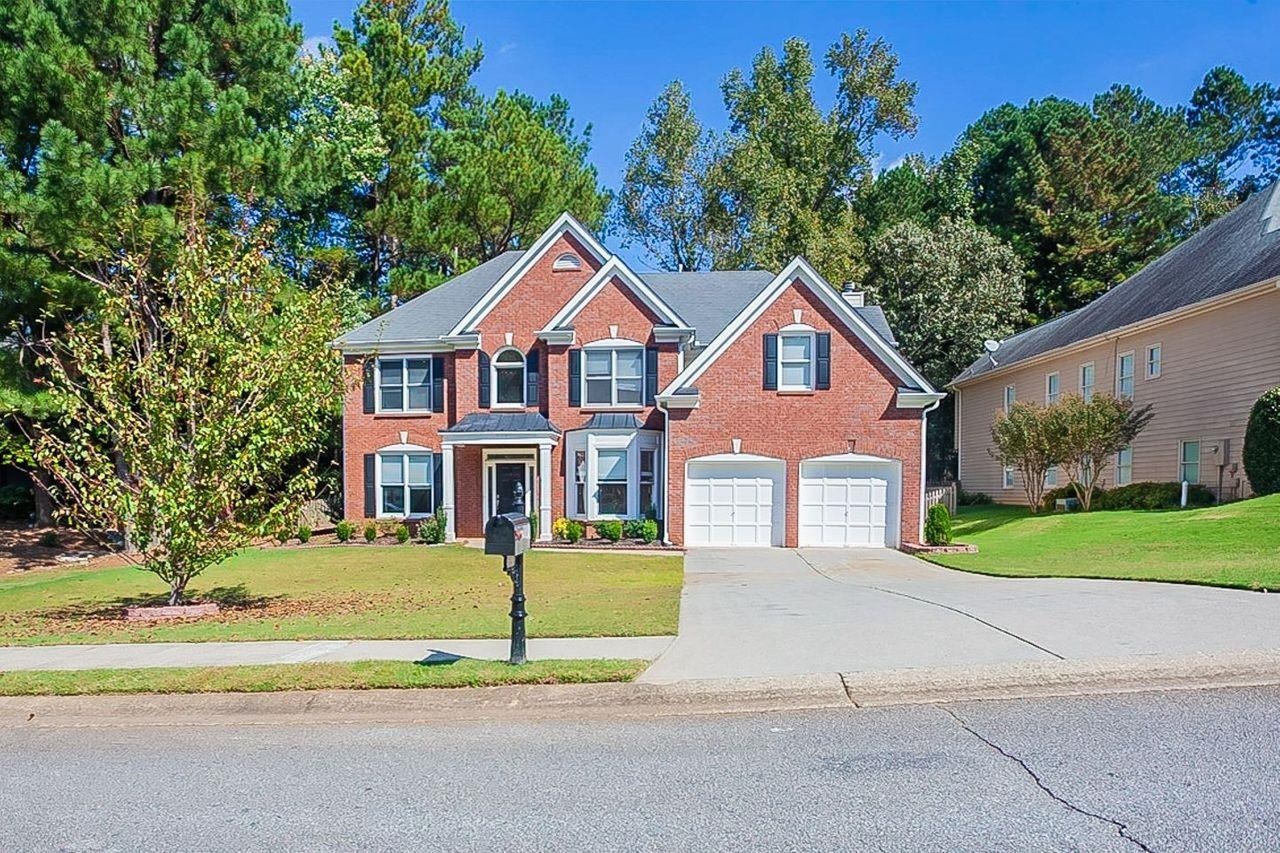 Fantastic brick front traditional home in Martins Farm! This home has a wonderful light filled 2-story foyer with formal living and dining areas. The kitchen has white cabinets and stainless appliances plus a kitchen island and it overlooks the 2-story great room. This home has wonderful arched openings that give it a European feel. Just off of the kitchen there is a screened patio with deck above off of the master bedroom! All of the bedrooms are on the upper level and the master bedroom is oversized and has a fireplace!! The master bathroom has double vanities and sinks and a corner soaking tub plus separate shower. This home needs a little extra work, but it has tons of great upgrades such as the main level flooring. This is a great swim/tennis community.