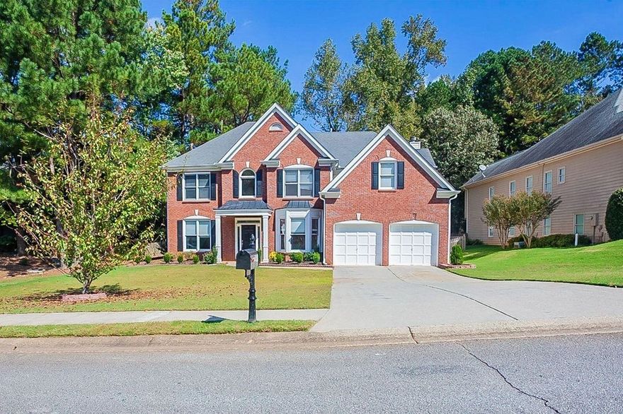 Fantastic brick front traditional home in Martins Farm! This home has a wonderful light filled 2-story foyer with formal living and dining areas. The kitchen has white cabinets and stainless appliances plus a kitchen island and it overlooks the 2-story great room. This home has wonderful arched openings that give it a European feel. Just off of the kitchen there is a screened patio with deck above off of the master bedroom! All of the bedrooms are on the upper level and the master bedroom is oversized and has a fireplace!! The master bathroom has double vanities and sinks and a corner soaking tub plus separate shower. This home needs a little extra work, but it has tons of great upgrades such as the main level flooring. This is a great swim/tennis community.