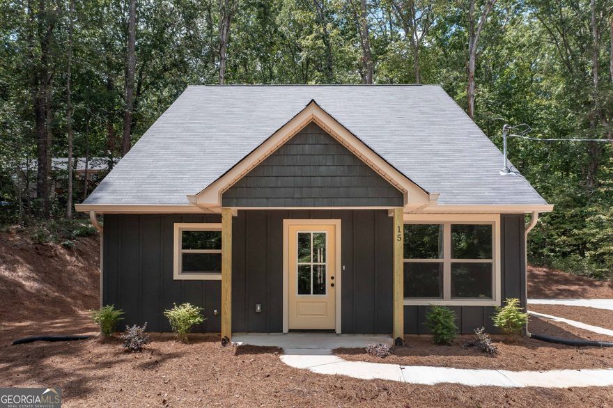 Breathtaking New Construction! This charming Craftsman-style home offers 3 bedrooms and 2 full bathrooms. Step inside to a warm, inviting living room that flows into a quaint kitchen featuring granite countertops, stainless steel appliances, and gleaming hardwood floors throughout. The main-floor primary suite boasts a spacious walk-in closet and a beautifully tiled shower with a double vanity. Upstairs, two additional bedrooms adjacent from the hall bathroom with a double vanity, perfect for family or guests. Don't wait-this one's hot on the market! Have your Realtor call today!