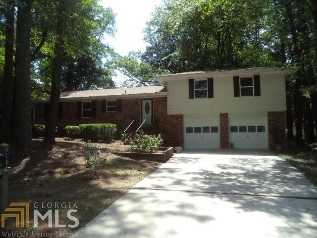4 sides brick home with major renovations, new flooring cabintry, appliances, ceiling fans and more, master with walk-in closet, granite countertops, new lighting, must see, open bright floorplan