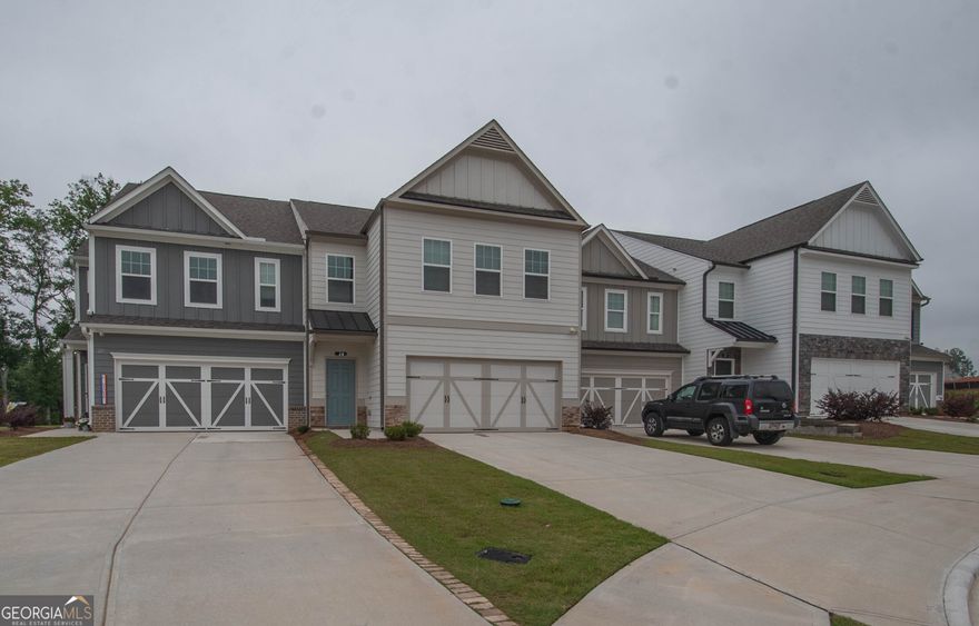 Charming 3BR, 2.5BA Home in the Heart of Newnan - Walk to The Linc!  Welcome to this beautiful home featuring an open-concept floor plan on a scenic lot with a private back patio-perfect for outdoor enjoyment. Located in the City of Newnan, this home offers walkable access to The Linc, a popular 20+ mile pedestrian trail that winds through the city and county.    Inside, you'll find a spacious family room that flows seamlessly into a bright, modern kitchen with granite countertops, stainless steel appliances, and an inviting bar area-perfect for gatherings and entertaining. A convenient powder room is thoughtfully placed just off the main living area. Durable and stylish LVP flooring runs throughout the entire main level.    Upstairs, the oversized Owner's Suite boasts an en suite bath with dual sinks, a linen closet, and a huge walk-in closet. Two additional bedrooms and easy access to shopping, dining, and local amenities complete this ideal offering.    Don't wait-this one won't last long!