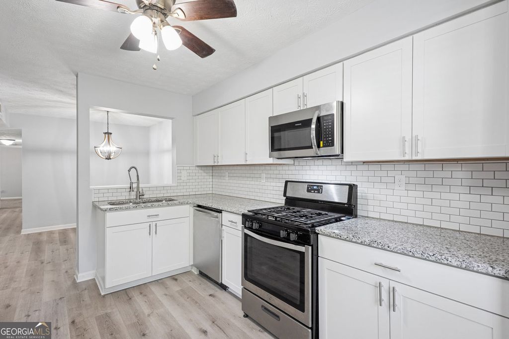 Photo of 6430 Oakleaf Way, Morrow, GA 30260 (MLS # 10738073)