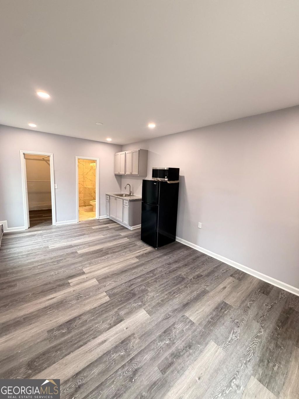 Photo of 4380 Reins Ridge UNI, Stone Mountain, GA 30083 (MLS # 10685356)