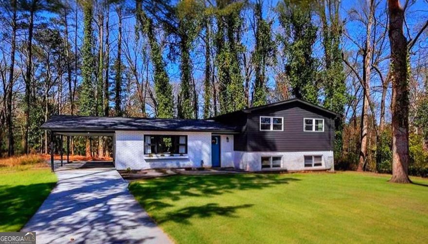 Stop scrolling. This fully renovated Marietta gem might be the home your family has been dreaming of! Nestled in the peaceful Hammond Woods community, this beautifully updated multi-level ranch-style home offers 3 bedrooms, 3 full bathrooms, and over 2,000 sq. ft. of light-filled living space designed for comfort and connection. From the moment you step inside, you will feel the warmth of the open layout, perfect for everyday living and special family moments.  This MOVE-IN READY HOME has been thoughtfully renovated with a BRAND-NEW KITCHEN featuring quartz countertops and white cabinets, updated bathrooms, stainless steel appliances, NEW FLOORING, NEW MODERN LIGHT FIXTURES, and NEW DOUBLE-PANE WINDOWS. Additional upgrades include a NEW WATER HEATER, ELECTRICAL PANEL AND METER, BRAND-NEW ROOF AND GUTTERS, FRESH INTERIOR AND EXTERIOR PAINT, A NEWLY PAVED DRIVEWAY, NEW MAILBOX, AND A FULLY MAINTAINED YARD. This kind of home does not come around often. Schedule your private tour today and imagine your family next chapter starting right here.
