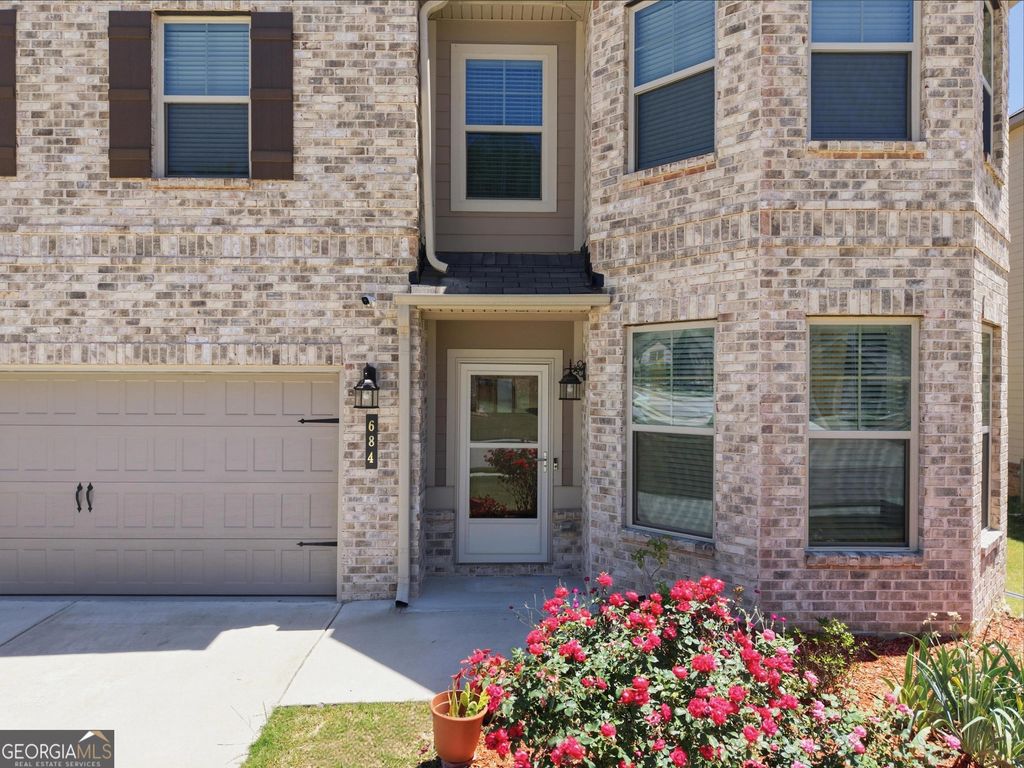 Photo of 684 Lakehaven Lane, Loganville, GA 30052 (MLS # 10765762)