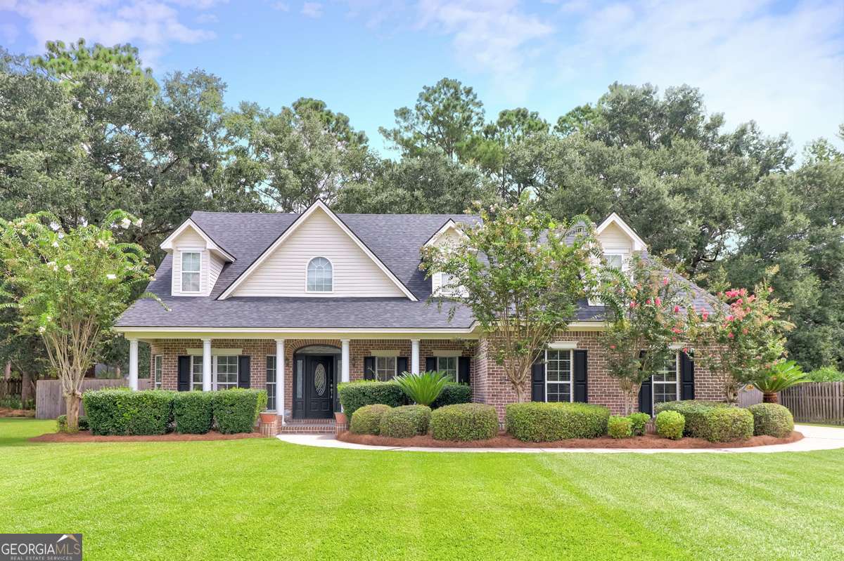 Beautiful ALL BRICK 4 BR/3 Bath Executive home nestled in a quiet Cul-de-Sac in the South Effingham School District. This spacious residence features a Formal Dining Room, Sunroom, and a Cozy Fireplace in the Family Room. The Gourmet Kitchen features granite countertops, a Bar, Island and a Chefs Pantry. The Primary En-Suite is located downstairs as well as a second bedroom and bath. Upstairs, youll find two additional Bedrooms, Full Bath and TWO BONUS ROOMS, perfect for a home office, gym, or playroom. Enjoy the large, fenced backyard ideal for entertaining. MOVE-IN-READY and perfect for families or first-time buyers with room to expand.